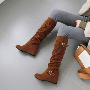 Faux suede slouch knee high boots with hidden wedge heels