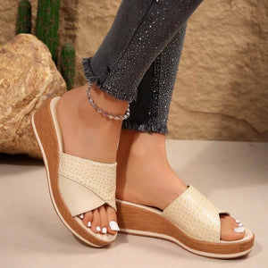 Stone patterned wedge heels slides