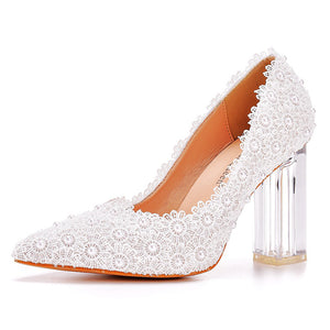 White floral lace bridal pumps with clear heels