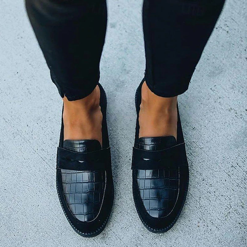 Women's black flat round toe penny loafers