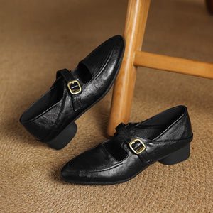 black Women's classic Mary Jane pumps with gold buckle