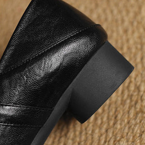 black Women's classic Mary Jane pumps with gold buckle