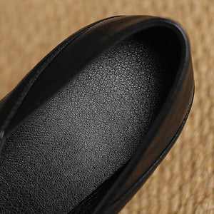 black Women's classic Mary Jane pumps with gold buckle