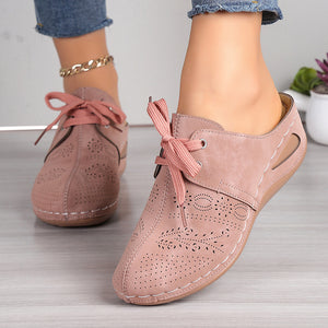 Women's closed toe low wedge mules