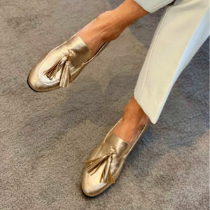 Women's gold metallic tassels loafers