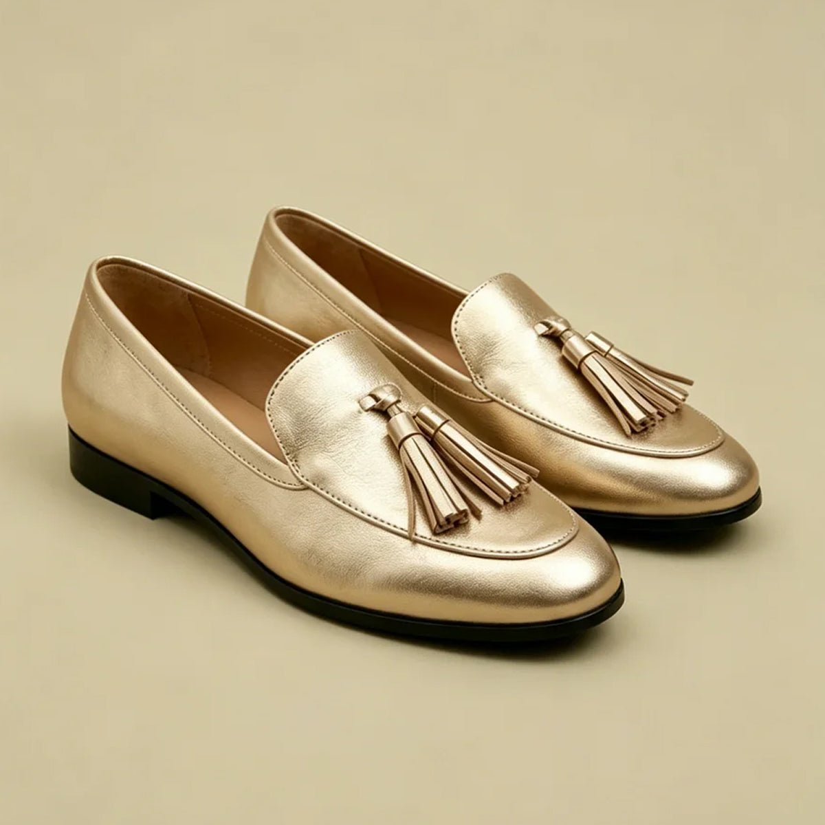 Women's gold metallic tassels loafers