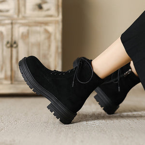 black Women's suede lace-up combat boots with zipper