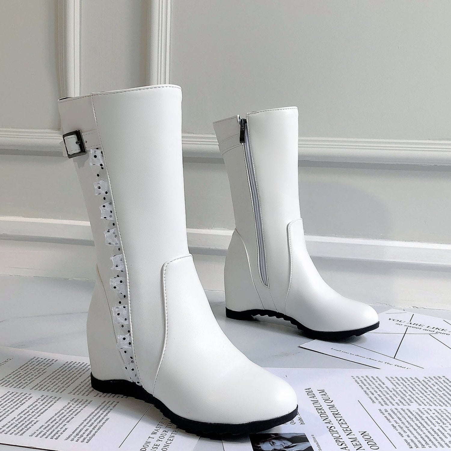 white Women's vintage mid calf boots with side lace trim