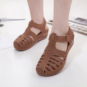 Women summer magic tape 
hollow out closed toe wedge sandals