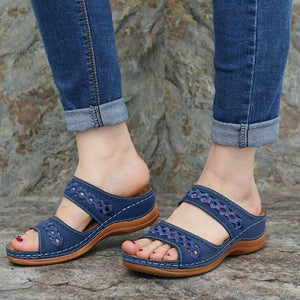 Women hollow out two strap 
wedge slide sandals