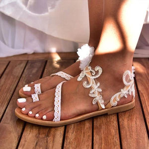 Women white flower strap 
ring toe bride wedding sandals