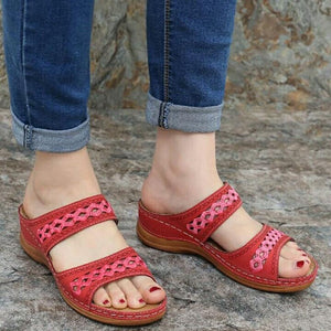 Women hollow out two strap 
wedge slide sandals
