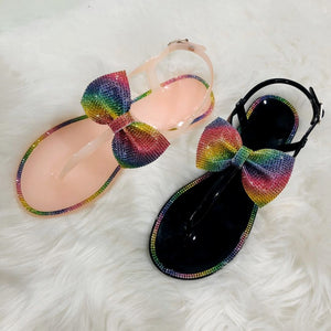 Women rainbow sparkly flat 
ankle strap bow sandals
