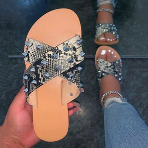 Women's studded criss cross slides
