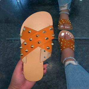 Women's studded criss cross slides