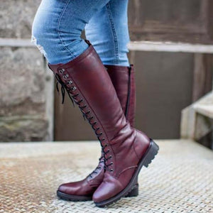 Women's low heel knee high riding boots