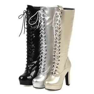 Women's knee high metallic platform high heeled combat boots with zipper