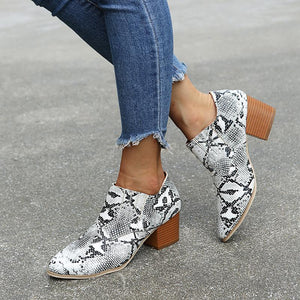 Women pointed toe chunky heel slip on ankle boots