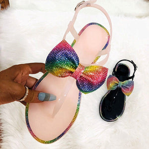 Women rainbow sparkly flat 
ankle strap bow sandals
