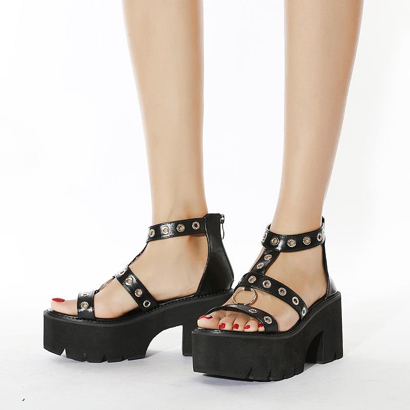 Women hollow studded strap 
chunky platform metal ring 
roman sandals